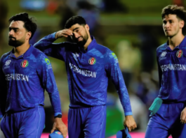 Rashid Khan exits the field after Afghanistan lost the T20 World Cup 2024 semifinal to South Africa on June 27.