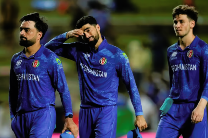 Rashid Khan exits the field after Afghanistan lost the T20 World Cup 2024 semifinal to South Africa on June 27.